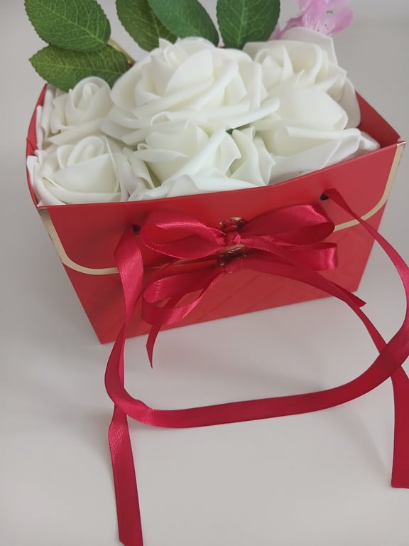 Handmade flower rose handbag with ribbon detail.