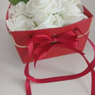Handmade flower rose handbag with ribbon detail.