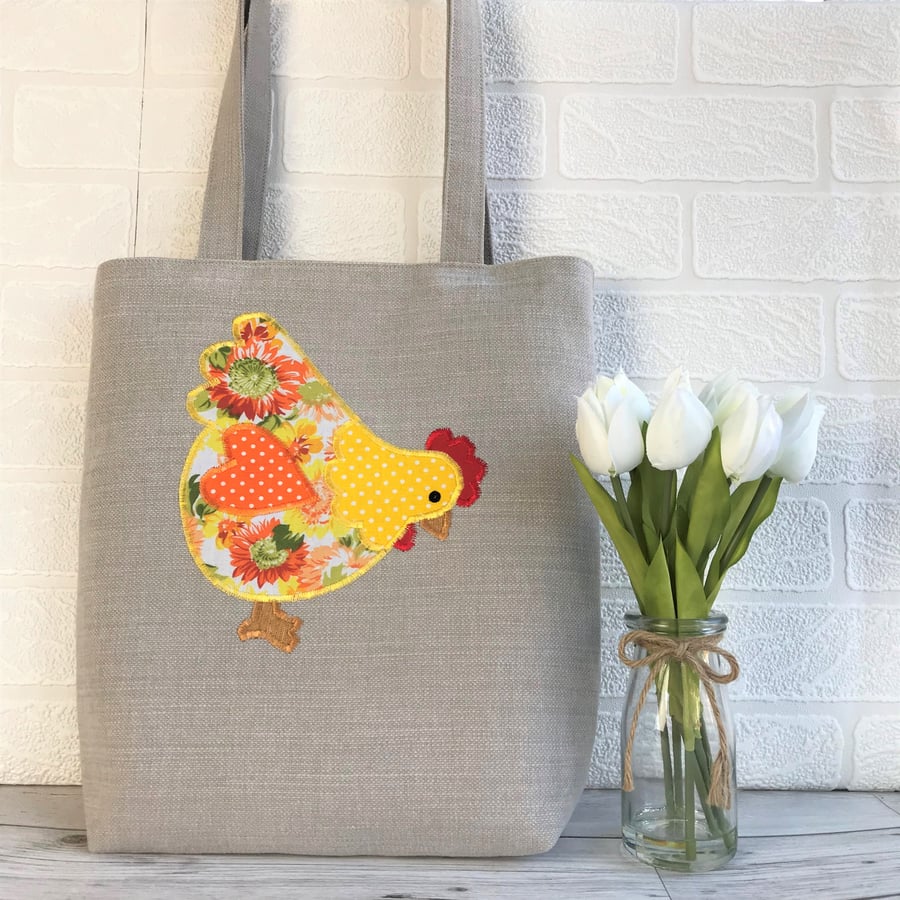 Chicken tote bag in beige with yellow and orange floral and polka dot chicken