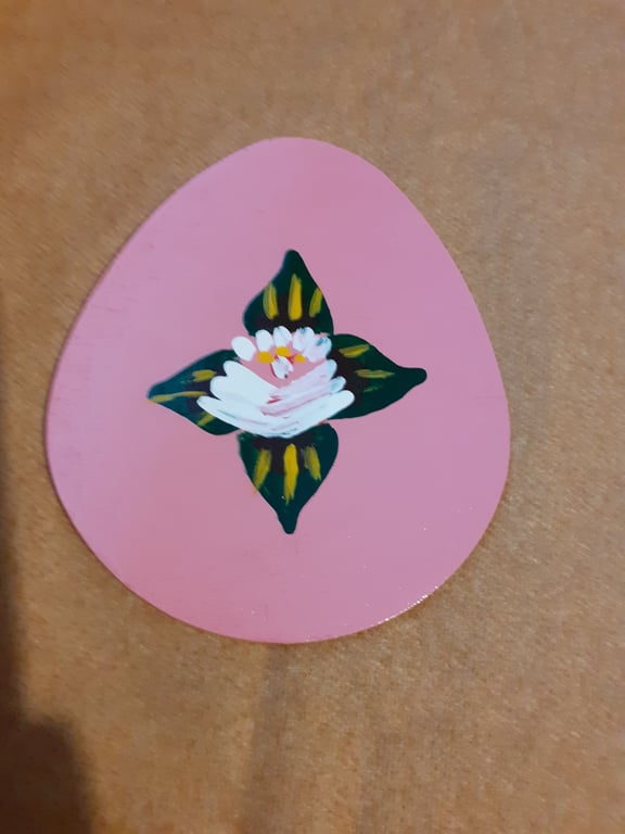 Egg shaped wooden magnet with canal art style rose