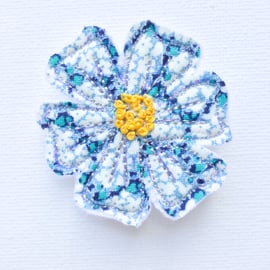 Flower brooch.