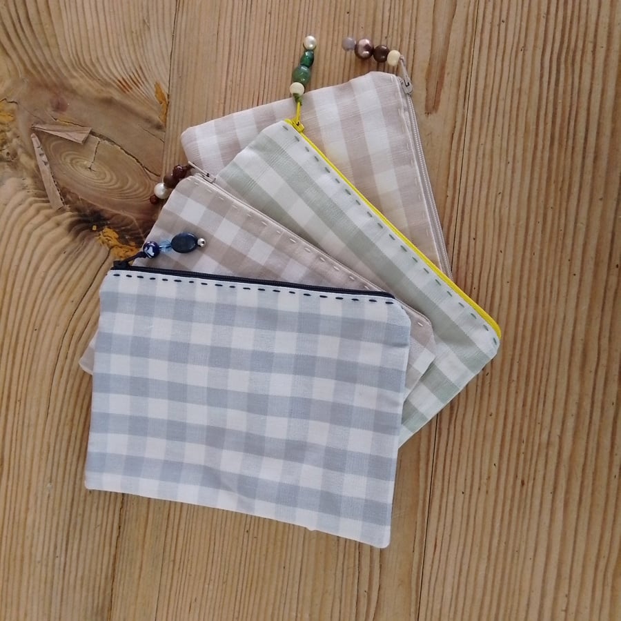 make up bags, fully lined and with zipper closure
