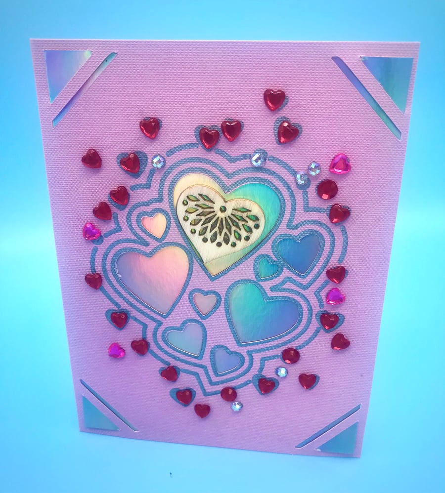 Beautiful pink and holographic heart card with red and pink rhinestones and wood