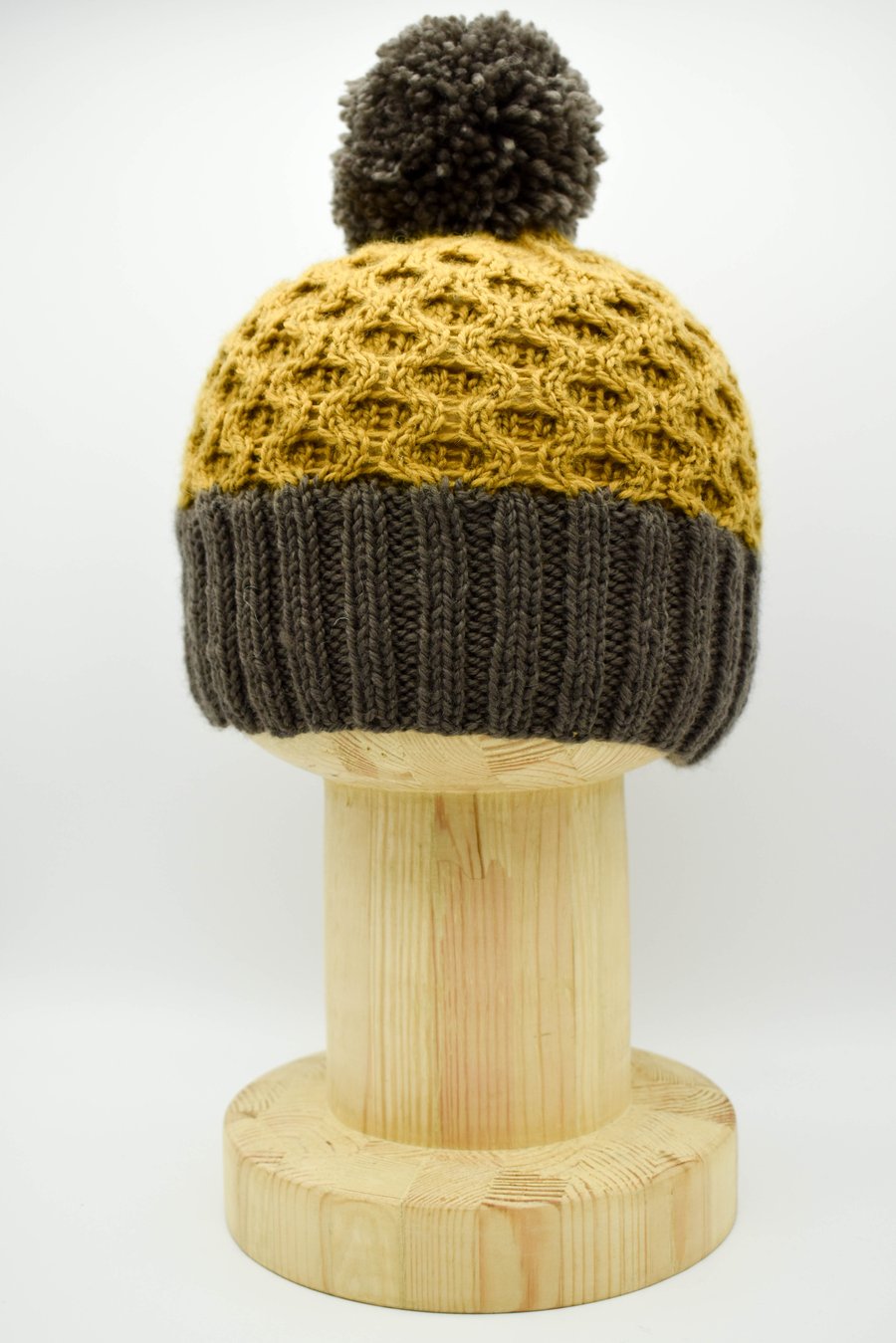 Hand Knitted "Honeycomb" Pom-pom hat in ochre and grey-brown
