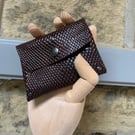 Leather purse in embossed brown leather