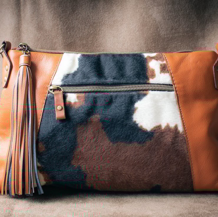 Faux cowhide bag on sale