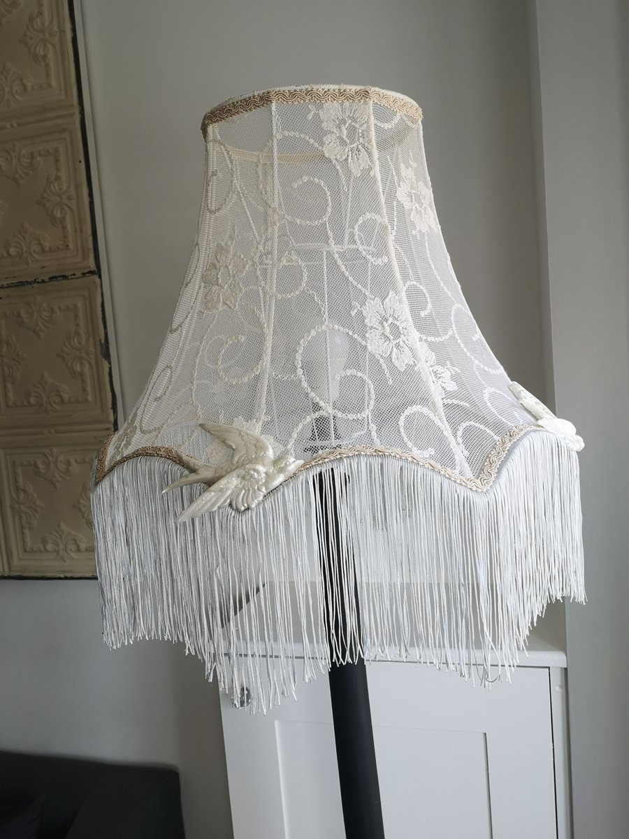 Lace lampshade with fringe and bird detail