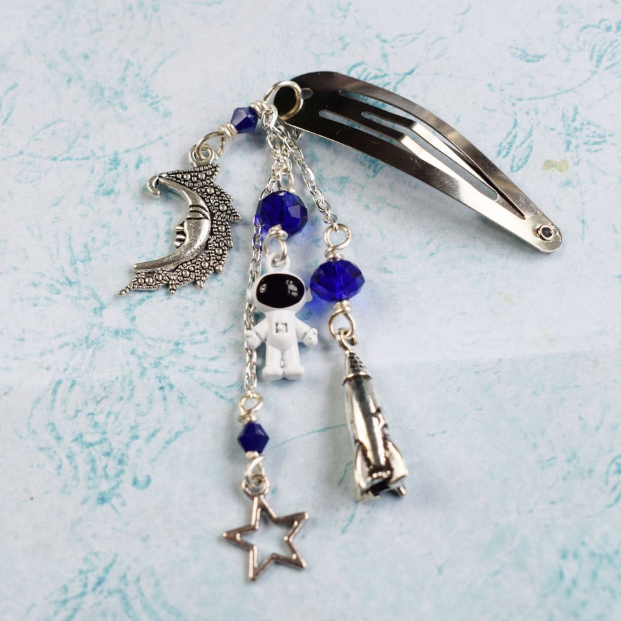 Space Themed Dangle Hairclip with Astronaut, Rocket, Moon and Star.