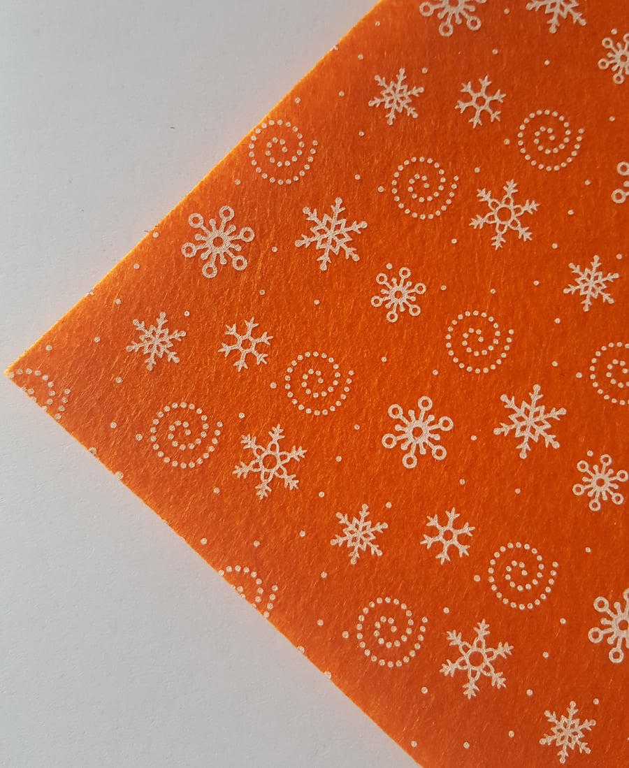 1 x Printed Felt Square - 12" x 12" - Snowflakes & Swirls - Orange 