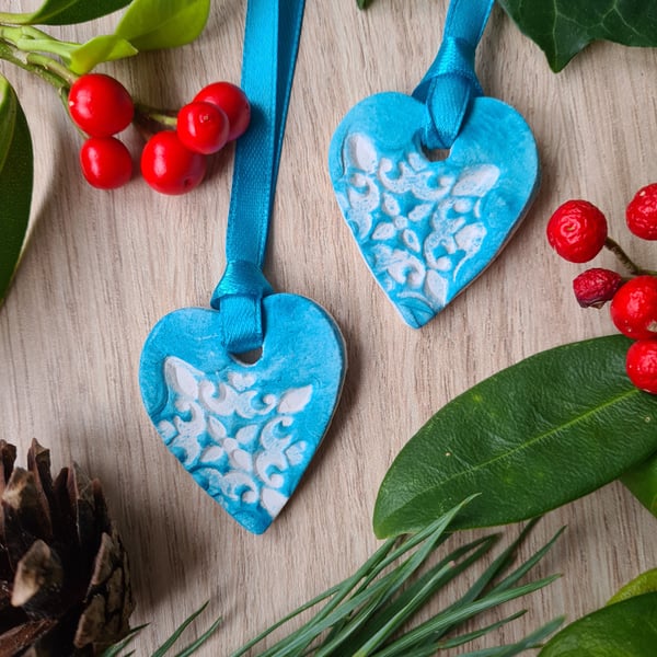 2 clay gift tags blue and white embossed Christmas decorations 