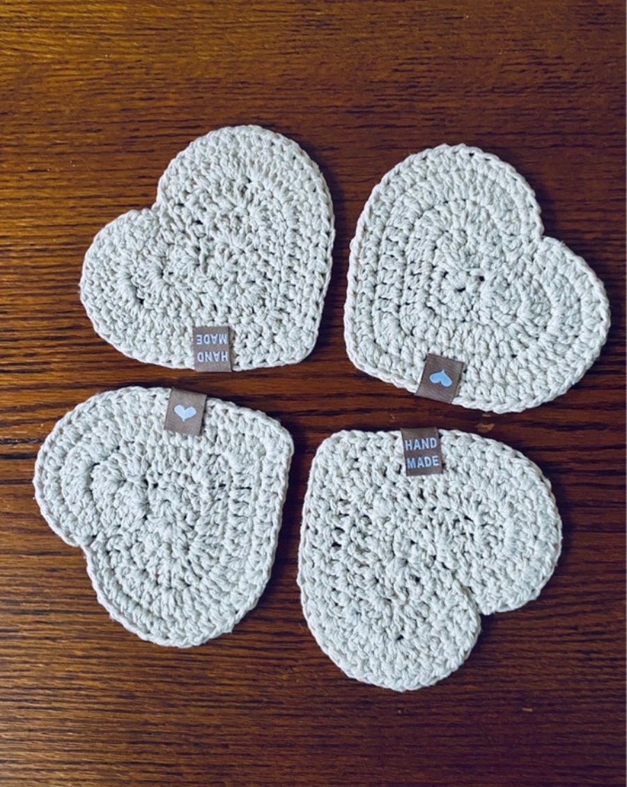 Crocheted heart coasters beige