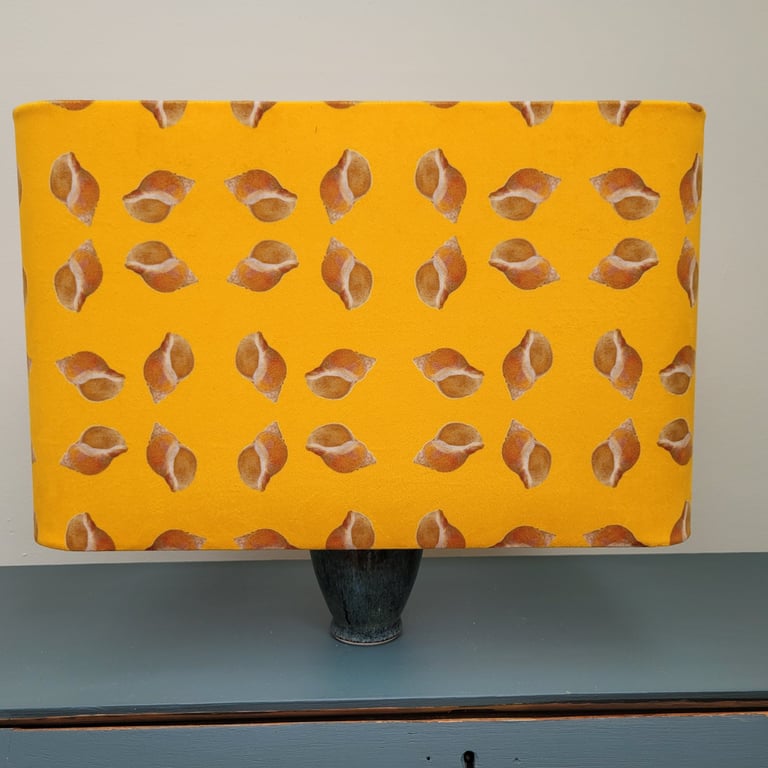 Rectangular table lamp lampshade with rounded corners and a unique shell design