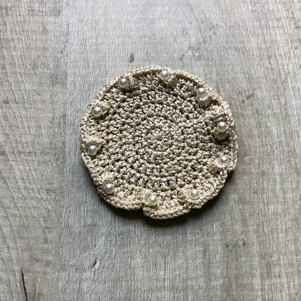Crochet coaster with beads