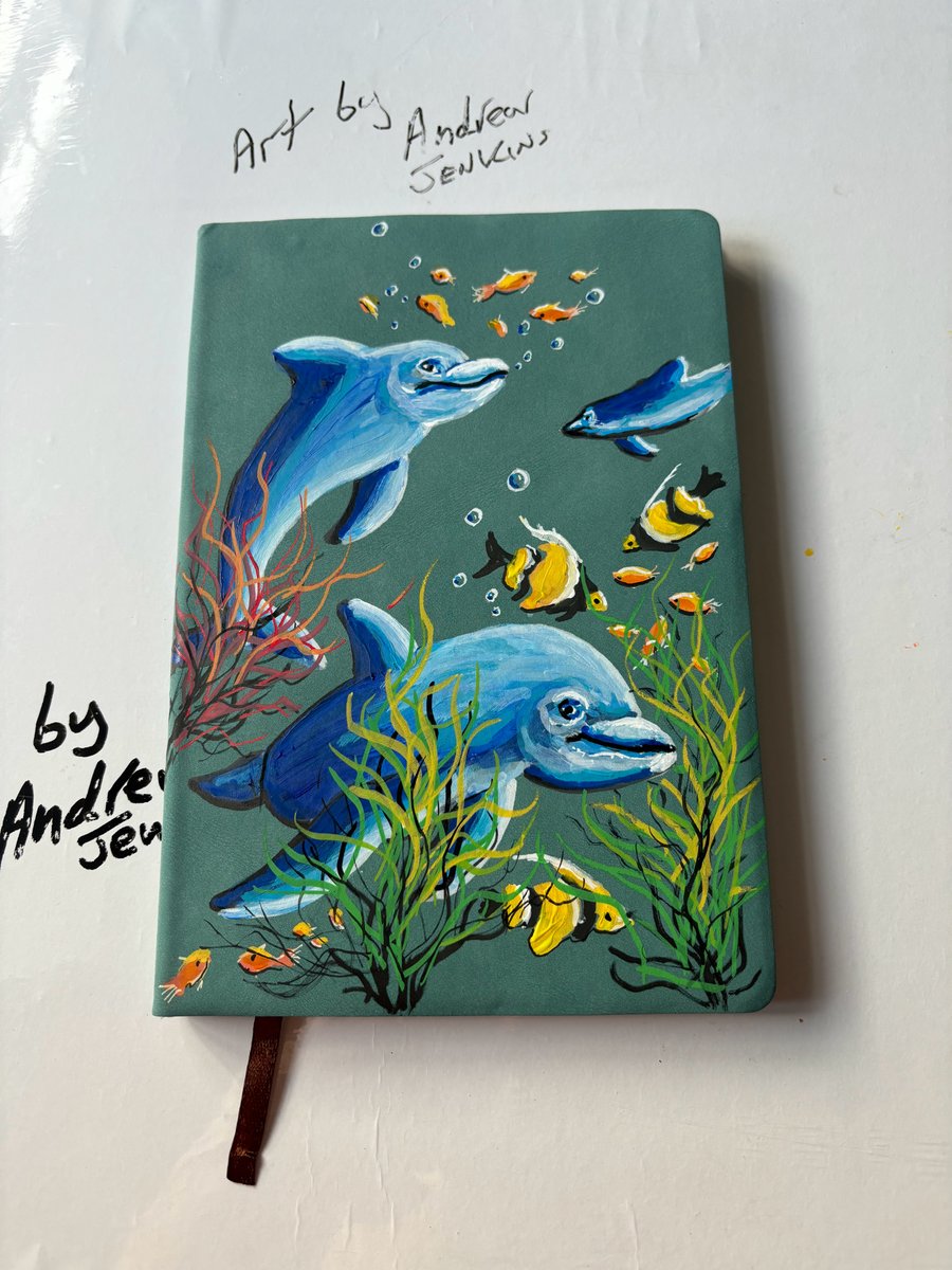 A hand painted and sealed faux leather journal by Andrew Jenkins 