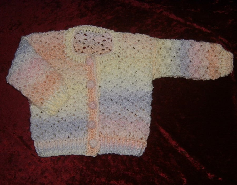 girl's crocheted cardigan in rainbow shades. ref C049