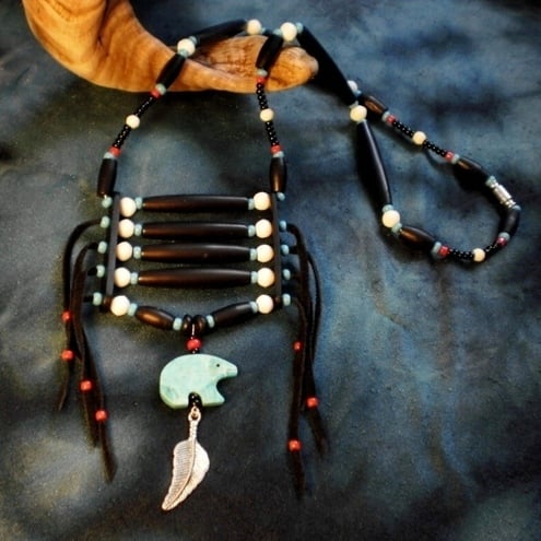 Carved bear fetish horn necklace