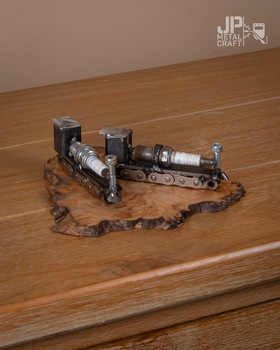 Spark plug train