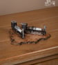Spark plug train