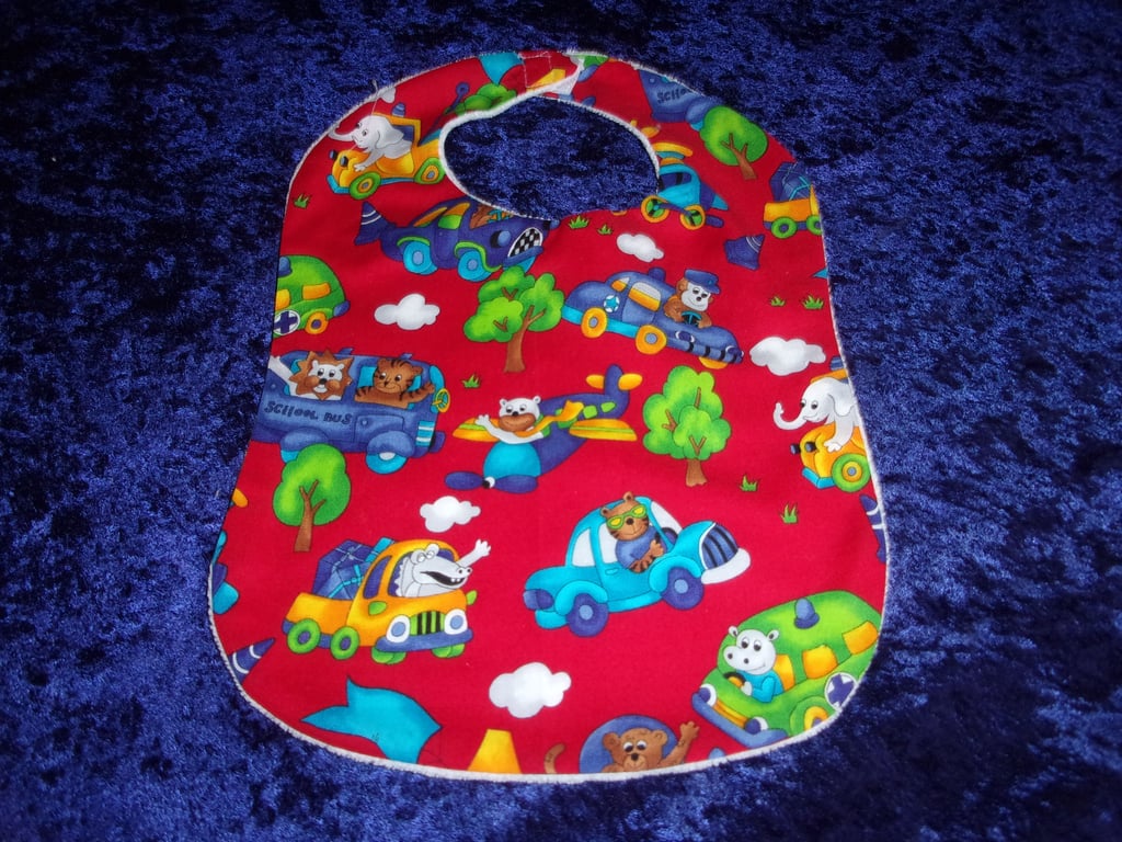 Babies Bib with Animals in Cars, Planes, Buses and Lorries