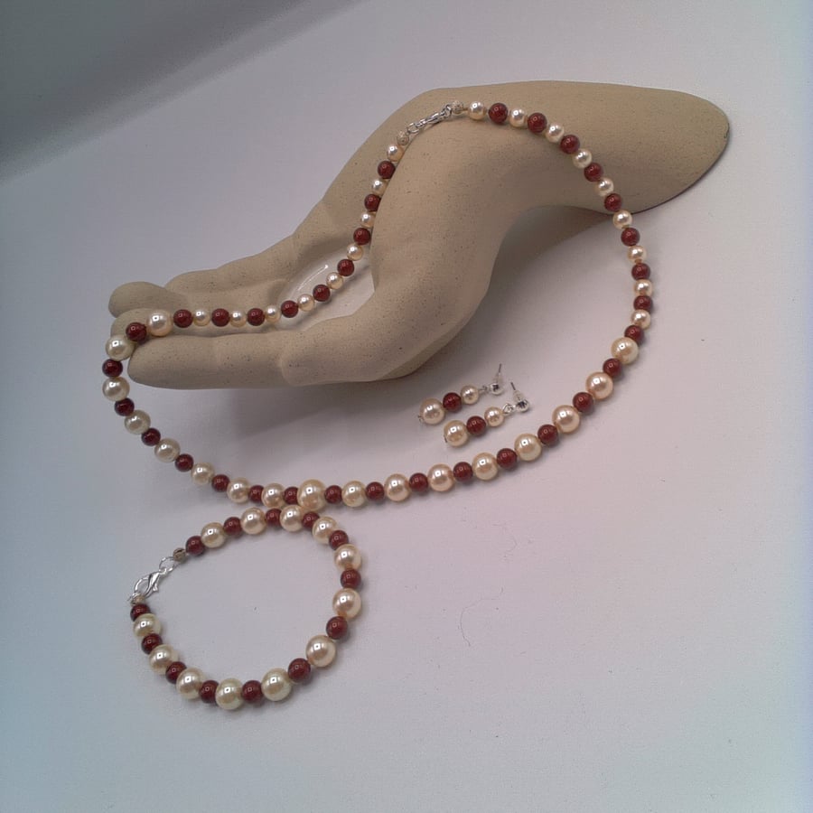 Maroon and Cream Pearl Jewellery Set Comprising a Necklace Bracelet and Earrings