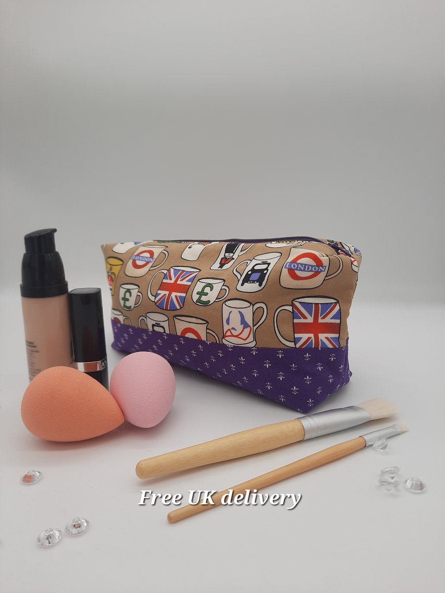 Makeup bag, British tea cup theme, boxed purple bag. 