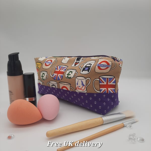 Makeup bag, British tea cup theme, boxed purple bag. 