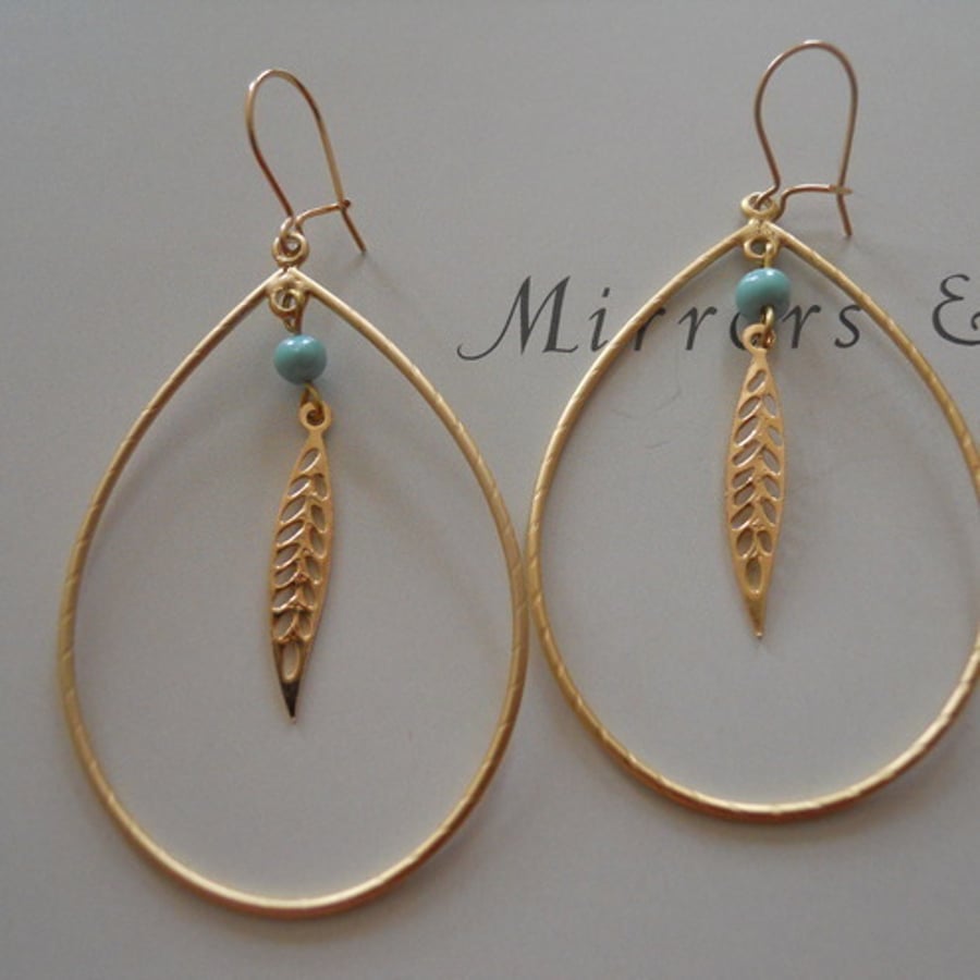 Large teardrop leaf gold earrings