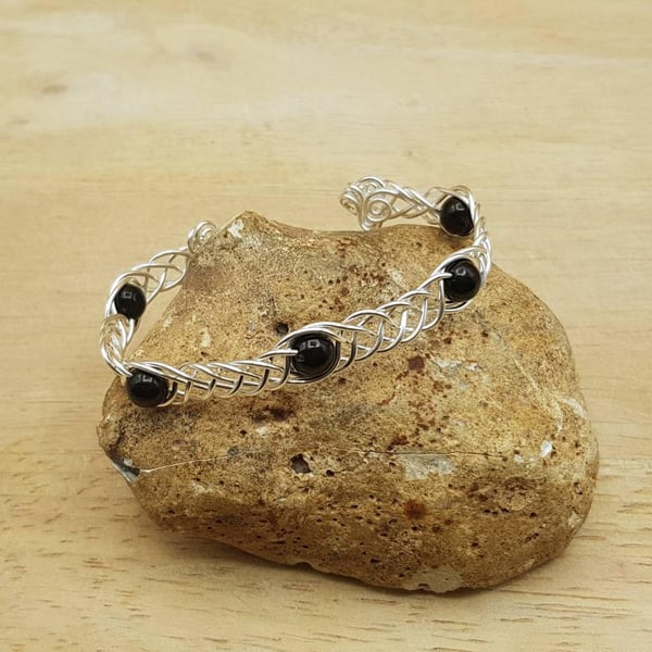 black Jet cuff bracelet. Celtic weave wire wrap