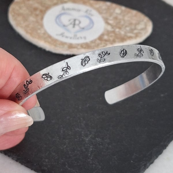 Handstamped floral silver aluminium cuff bracelet 
