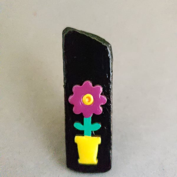 Bright wooden flower brooch