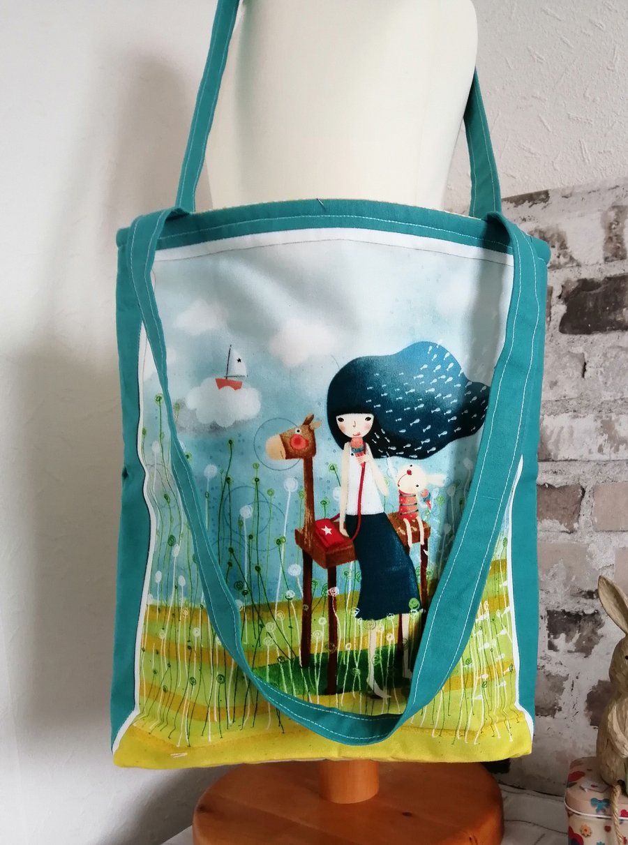 BLUE TOTE WITH PICTURE PANEL