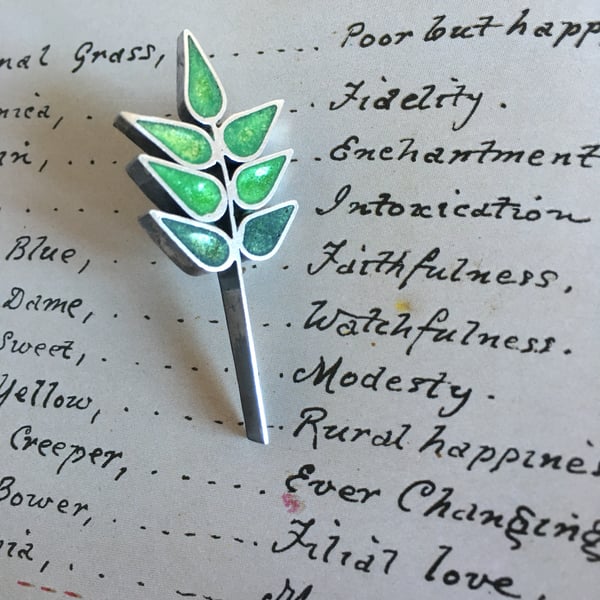 Grass seed brooch in the Language of Flowers.