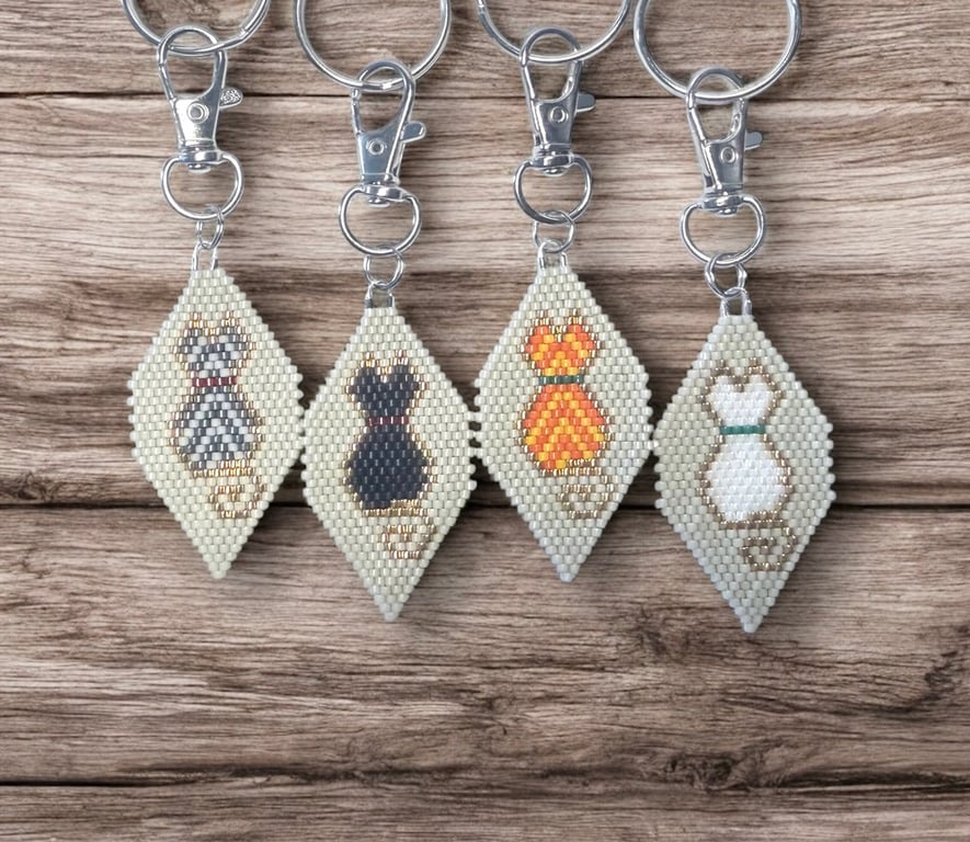 Black, ginger, tabby and white beadwork cat bag charm keyring