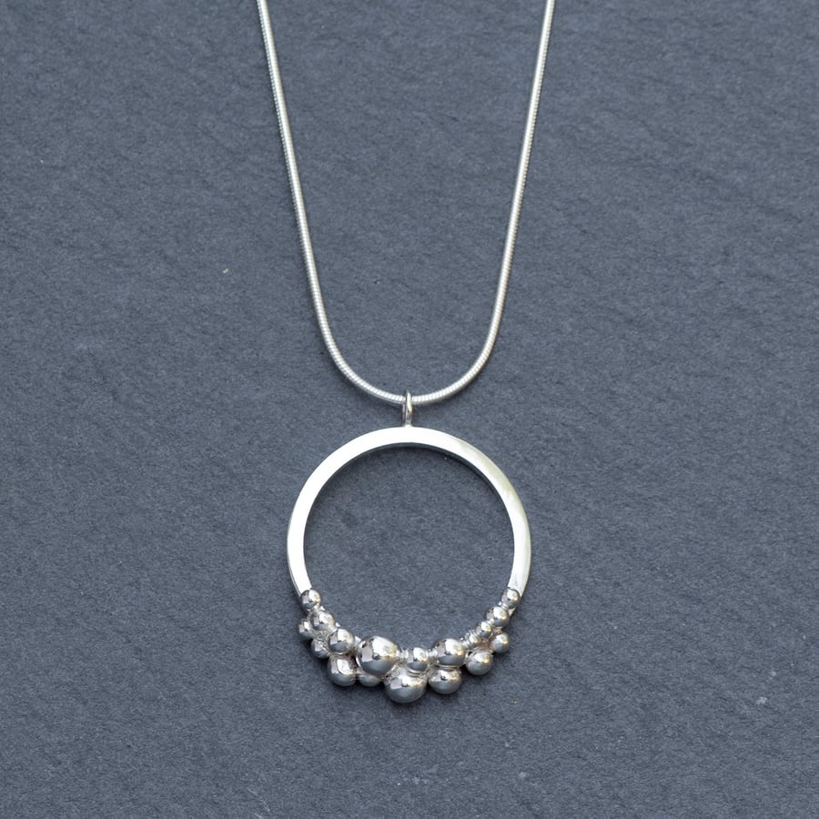 Granulated ring pendant