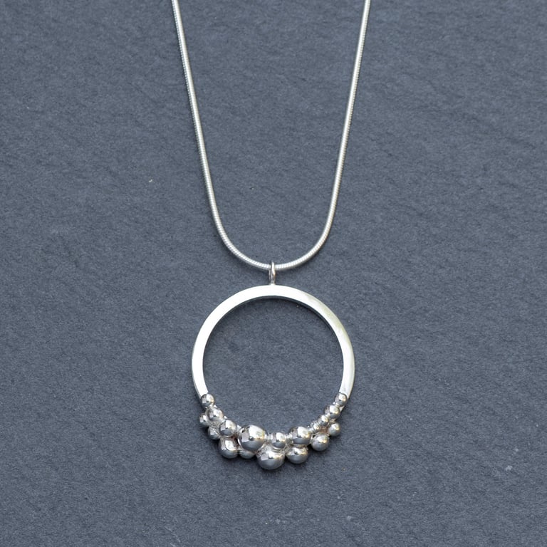 Granulated ring pendant