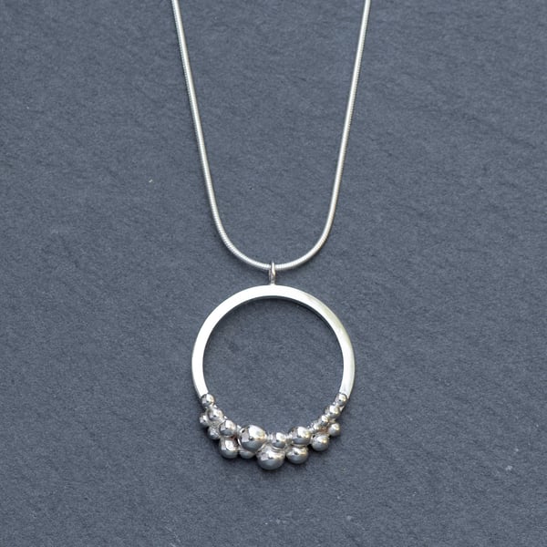 Granulated ring pendant