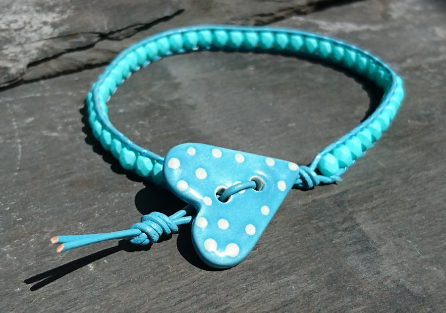 Turquoise leather and glass bead bracelet with ceramic heart polka dot button