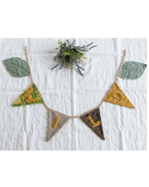 Personalised Safari Nursery Bunting, 'WILD' Signature Leaf Garland