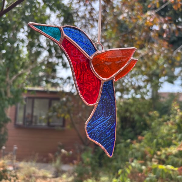 Stained glass humming bird suncatcher