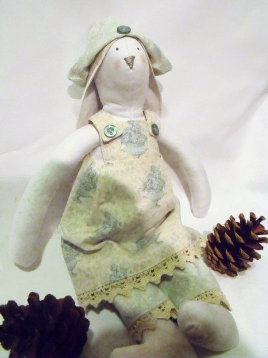 Tilda style cream bunny rabbit doll for display, green floral outfit