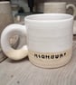 Highbury logo Wheel thrown durable stoneware mug.