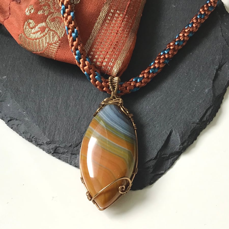 Wire wrapped banded agate - orange, blue