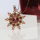 Bronze and Red Snowflake Pendant