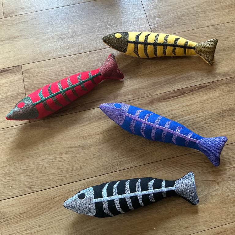 Skelefish……Embroidered  fish bones catnip kicker toy.