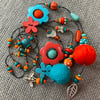 “Orange and Turquoise” lariat necklace