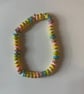 A cute bracelet with a pastel rainbow and gold beads!!!