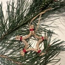 Jute star decoration with red accent 