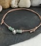 Adjustable cotton cord anklet with green aventurine and shell charm