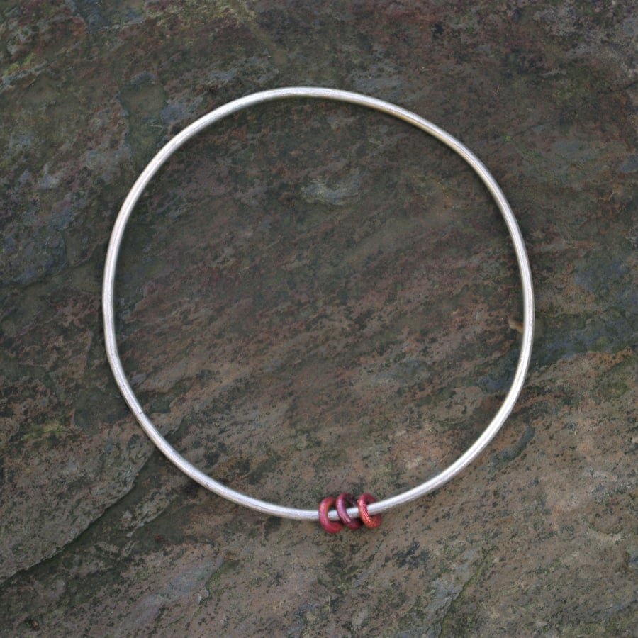 Silver  Bangle with Copper Spinners