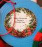 Christmas tree decoration of a Seal, airdry clay with a fabric hat and scarf.   - Image 7